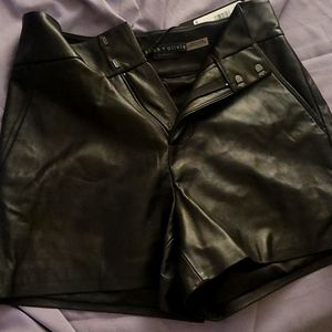 Black lamb leather shorts by Alice + Olivia, size0